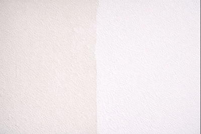 Comparaison de couverture entre première et deuxième couche de peinture